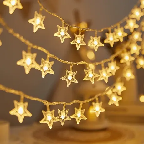 Guirnalda de luces solares con estrellas — foto del anuncio del proveedor